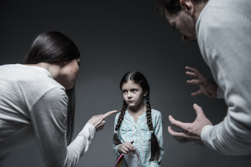 a parent is scolding their children
